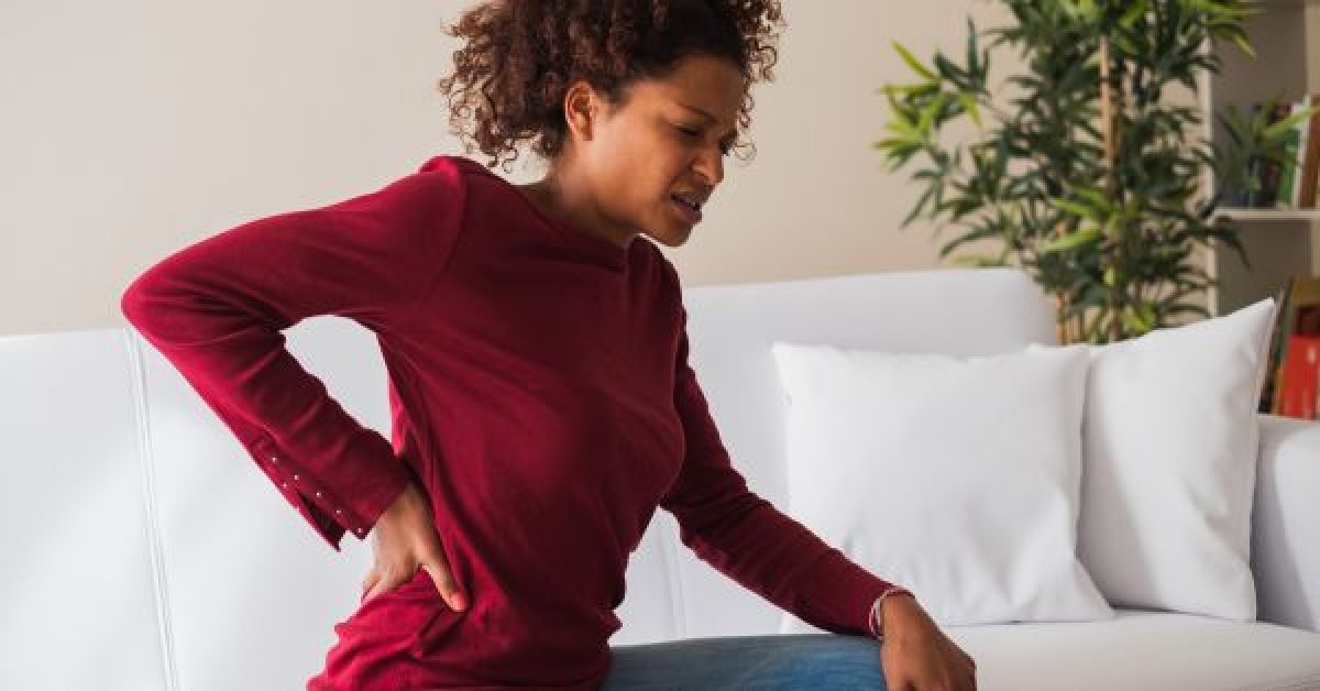 what causes lower back pain in females